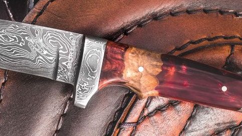 The BEST Knife Handle Materials: A Complete Guide 10 a random knife with a wood handle