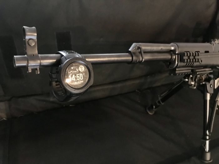 My Love Hate For The Garmin Instinct Tactical: An Unbiased Review 12 garmin instinct tactical hanging off the barrel of an SKS
