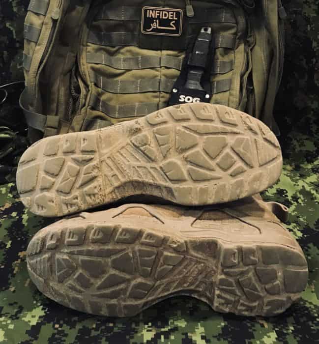 LOWA Z-8S tactical boots tread is all worn off due to military drill practice. Displayed next to 5.11 Rush72 Tactical Pack and SOG SEAL Team Elite