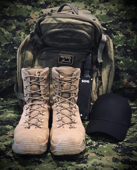 LOWA Z-8S tactical boots displayed next to the 5.11 Rush72 Tactical back pack and the SOG SEAL Team Elite knife. 5.11 stretch fit cap