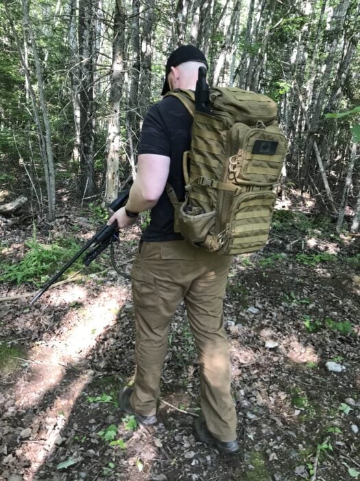 Are Tactical Boots Good For Hiking? The Final Answer 4 Salomon XA Forces mid - hiking through the woods on a bear hunt
