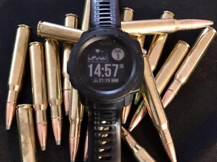 My Love Hate For The Garmin Instinct Tactical: An Unbiased Review 2 GARMIN INSTINCT TACTICAL DISPLAYED ON 30-06 ROUNDS