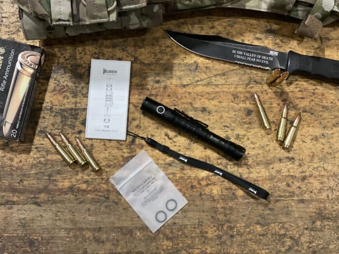 Wuben T2 Review: A Small and Powerful Backup Tactical Flashlight 7 the wuben t2 comes with instructions, wrist lanyard, and 2 extra o-rings
