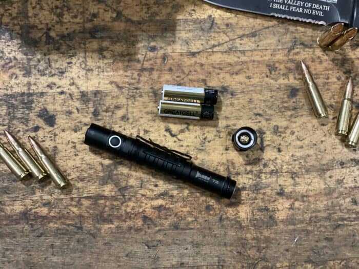 Wuben T2 Review: A Small and Powerful Backup Tactical Flashlight 17 The Wuben T2 back up tactical flashlight takes 2 AA batteries