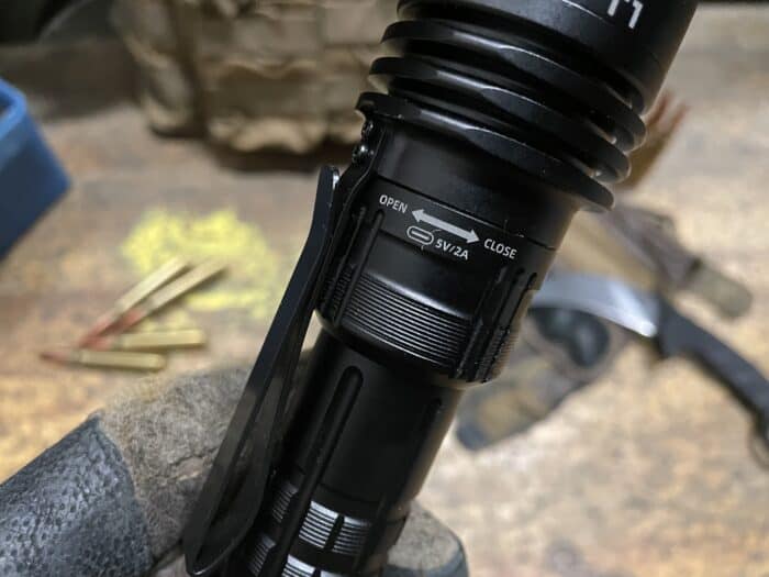 Wuben T1 Review: Is It The Best Tactical Flashlight? 13 The Wuben T1 Tactical Flashlight as a protective ring over its charging port