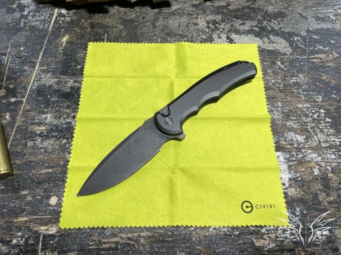 Civivi Praxis Review: Affordable Performance and Everyday Reliability 7 the CIVIVI Praxis on the cleaning / display cloth that comes with it