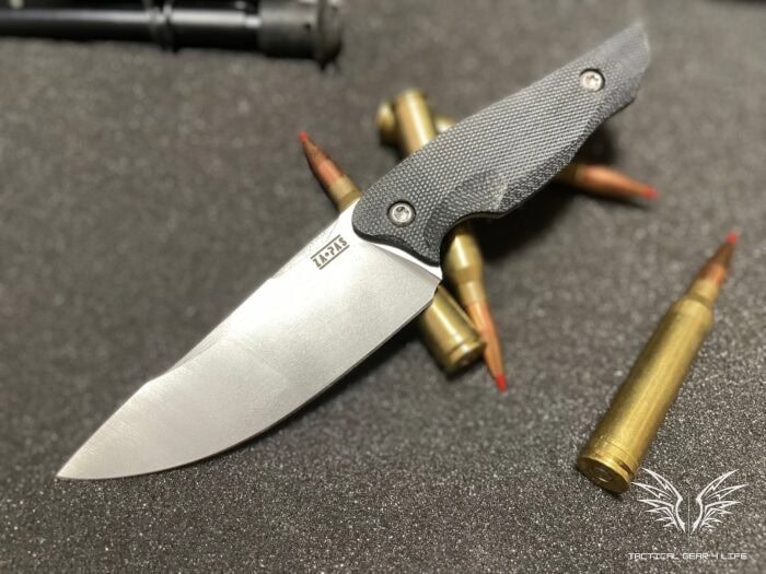 Nija Tactical Knife Review: The Polish-Built Blade Made for Self-Defense 2 Nija tactical knife posed on scustom made 300 wm rounds