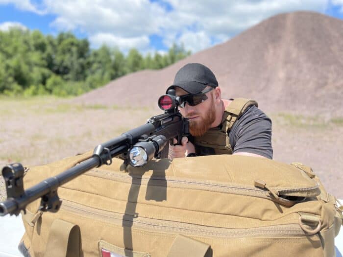 Fenix TK22 TAC Tactical Flashlight Review: Annihilate the Darkness 4 The Fenix TK22 Tac tactical flashlight mounted on an SKS with an arch angel stock