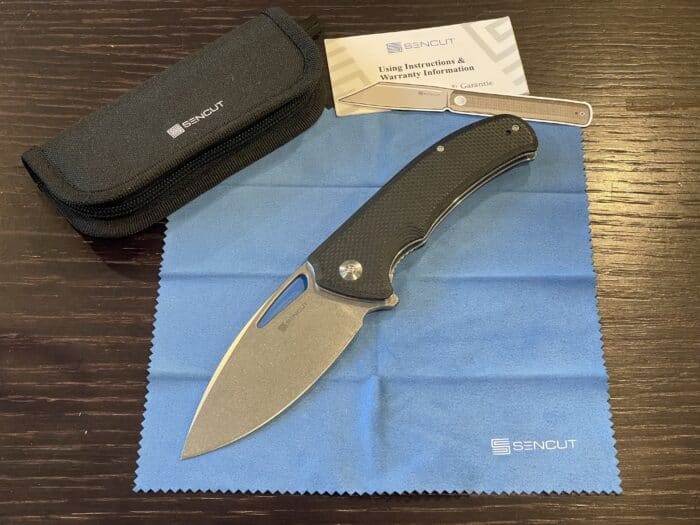 SENCUT Phantara Review: A Very Capable EDC 5 SENCUT Phantara comes with a zippered velvet hold, warranty card and stickers