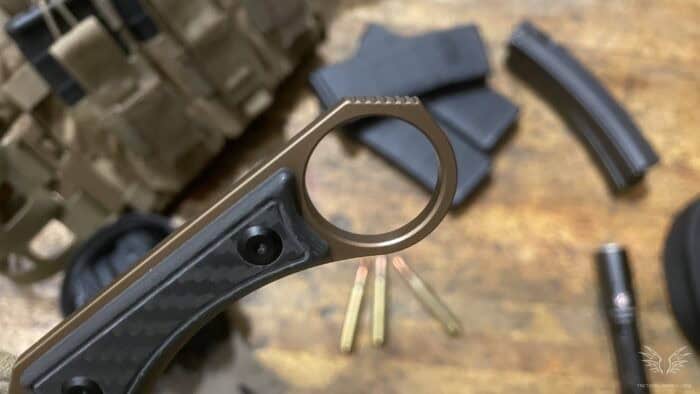 Kansept Niko Review: A Tough, No-Nonsense Tactical Knife 11 the Kansept Niko tactical knife has a secure ring so you never lose it mid use