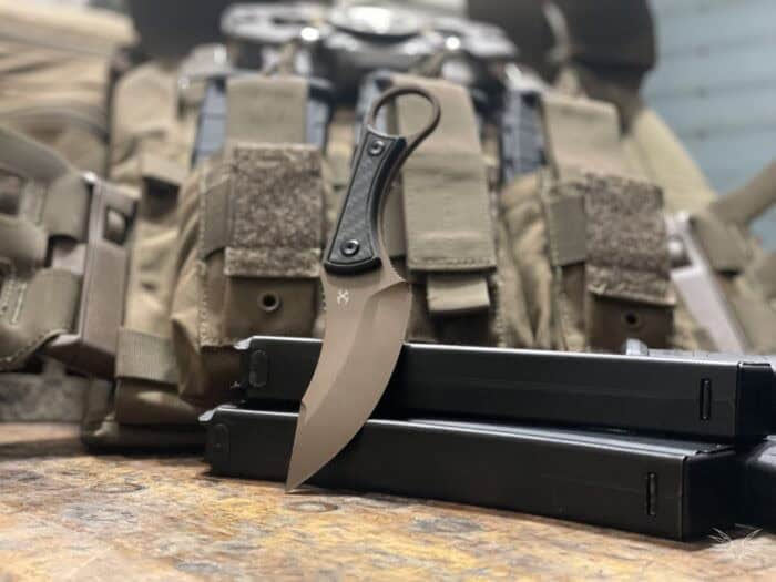 Kansept Niko Review: A Tough, No-Nonsense Tactical Knife 3 Kansept Niko tactical knife with the 5.11 QR Plate Carrier