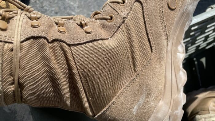 the GORUCK MACV-2 has a large strip of nylon webbing on either side of the ankle for strength and support