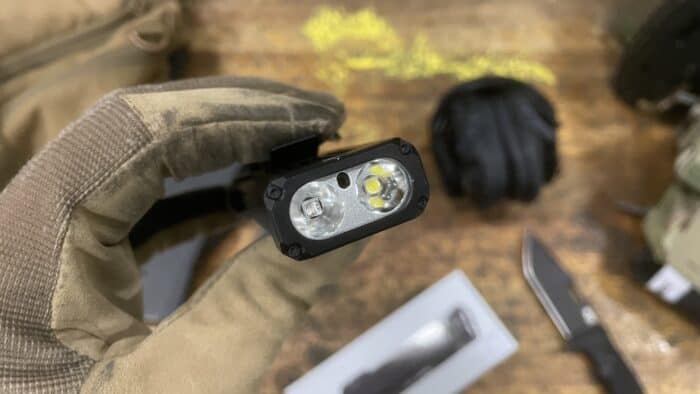 The wuben x5 has a decently bright flashlight